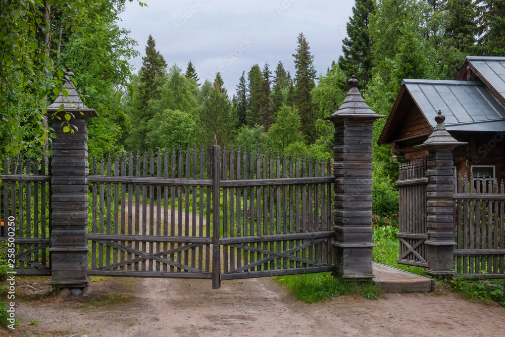 SOLOVKI, REPUBLIC OF KARELIA, RUSSIA - JUNE 27, 2018: Entrance to the Botanical garden of the Solovetsky Islands. Solovki Islands, Arkhangelsk region, White Sea SOLOVKI, REPUBLIC OF KARELIA, RUSSIA - JUNE 27, 2018: Entrance to the Botanical garden of the Solovetsky Islands. Solovki Islands, Arkhangelsk region, White Sea
