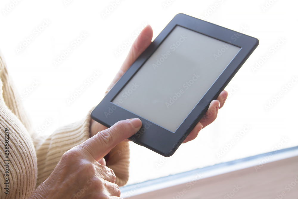 senior woman at home with digital tablet or laptop senior woman at home with digital tablet or laptop