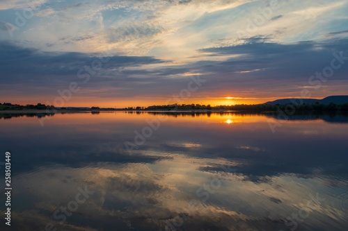 Sunset on a lake in Hohenrode in Germany photo