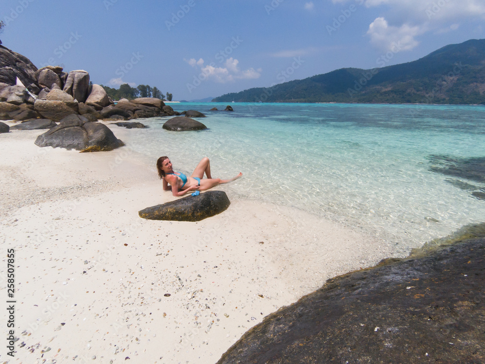 woman on an isolated beach in Andaman sea, Koh Lipe - solo travel woman on an isolated beach in Andaman sea, Koh Lipe - solo travel