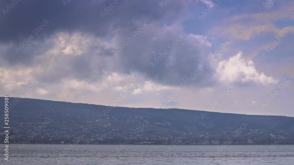 Amazing landscape near the sea with clouds above the city Amazing landscape near the sea with clouds above the city