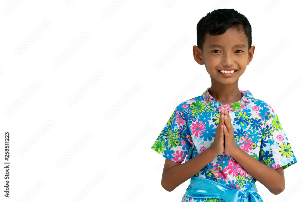 Thai children with traditional Thai costumes Hello with a smile. With isolated white background and clipping path. Thai children with traditional Thai costumes Hello with a smile. With isolated white background and clipping path.