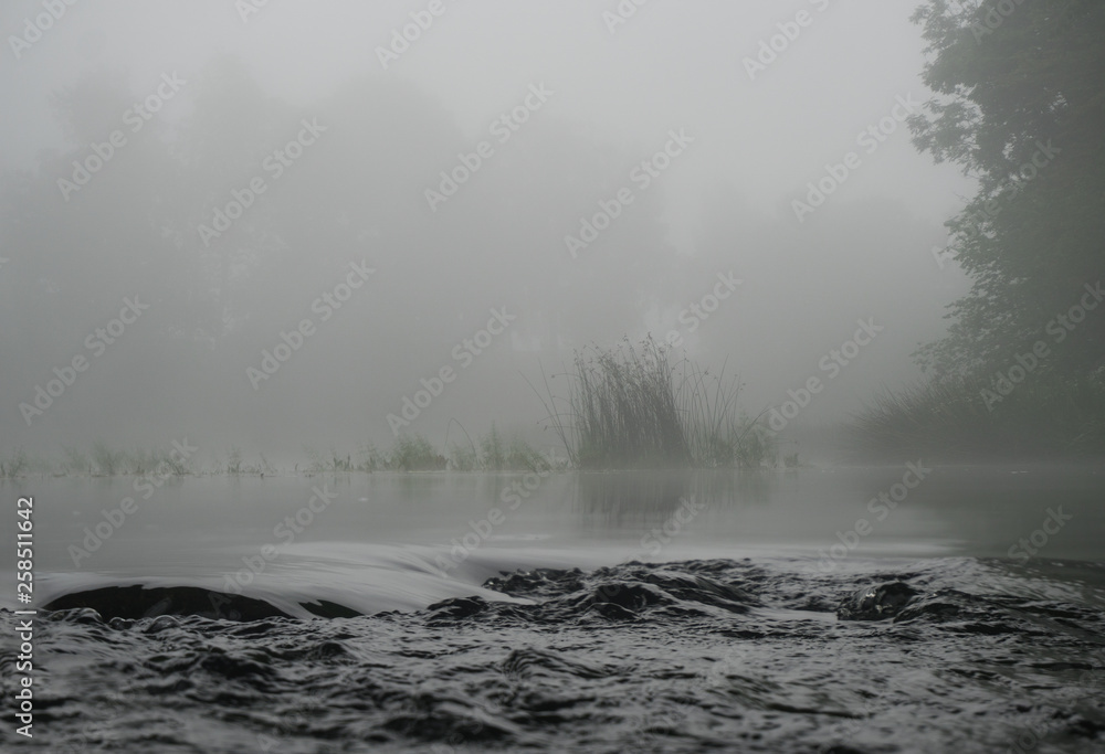 Fototapeta premium Foggy river early in the morning