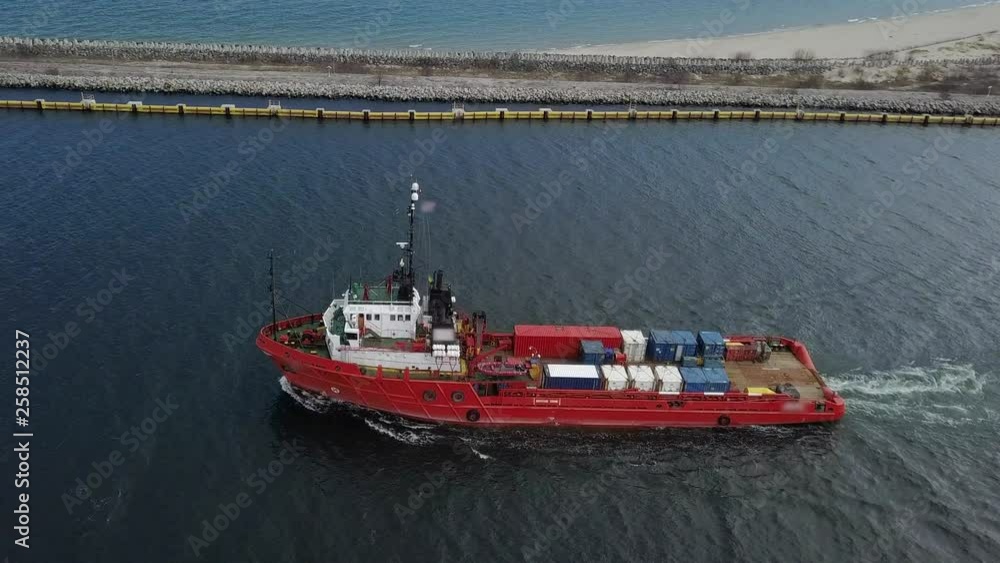 Aerial of Red Boat Swimming Towards Open Sea Tracking Shot Aerial of Red Boat Swimming Towards Open Sea Tracking Shot