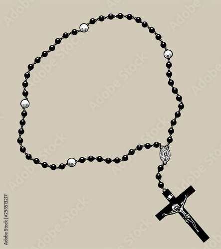 Prayer beads with and a black cross with the crucifixion