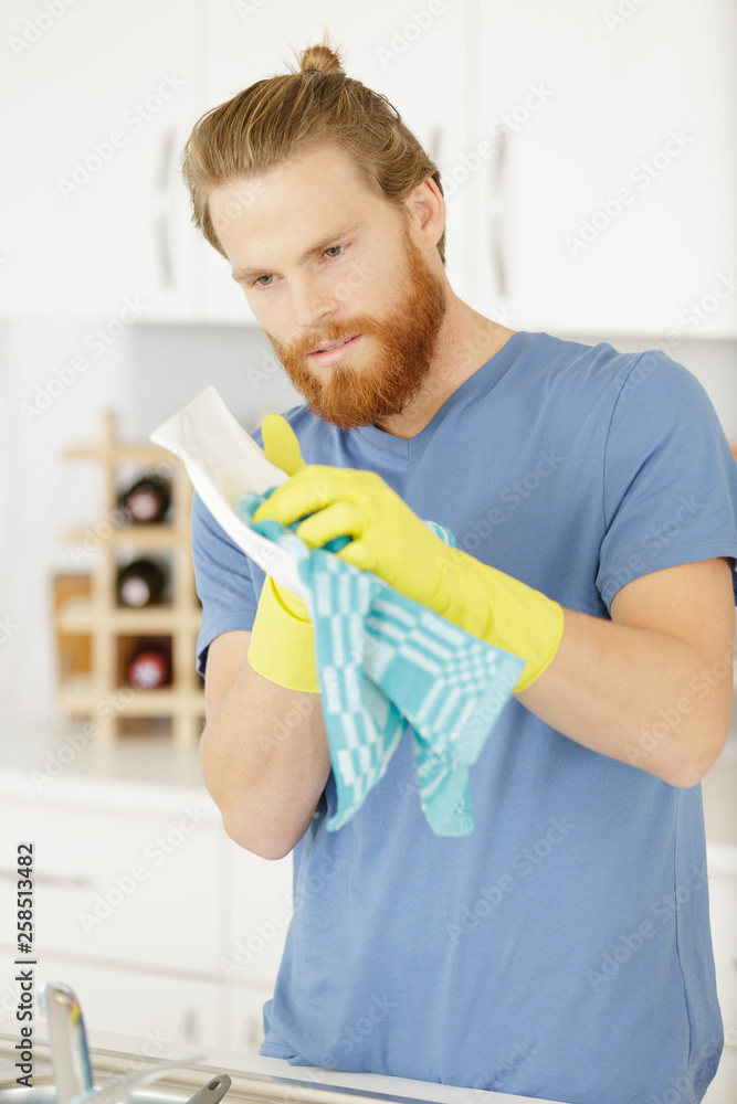 man washing dishes in the sink man washing dishes in the sink