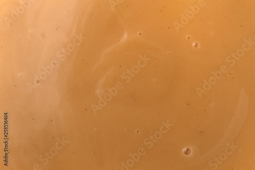 Close view of creamy brown turkey gravy. photo