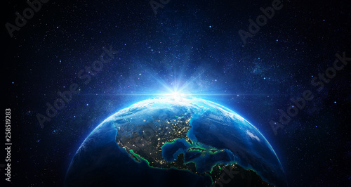 Fototapeta Naklejka Na Ścianę i Meble -  Sunrise In The Space - Blue Earth With City Lights - Usa elements of this image furnished by NASA - 3d Rendering