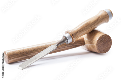 chissel and woodworkers wooden small mallet isolated photo