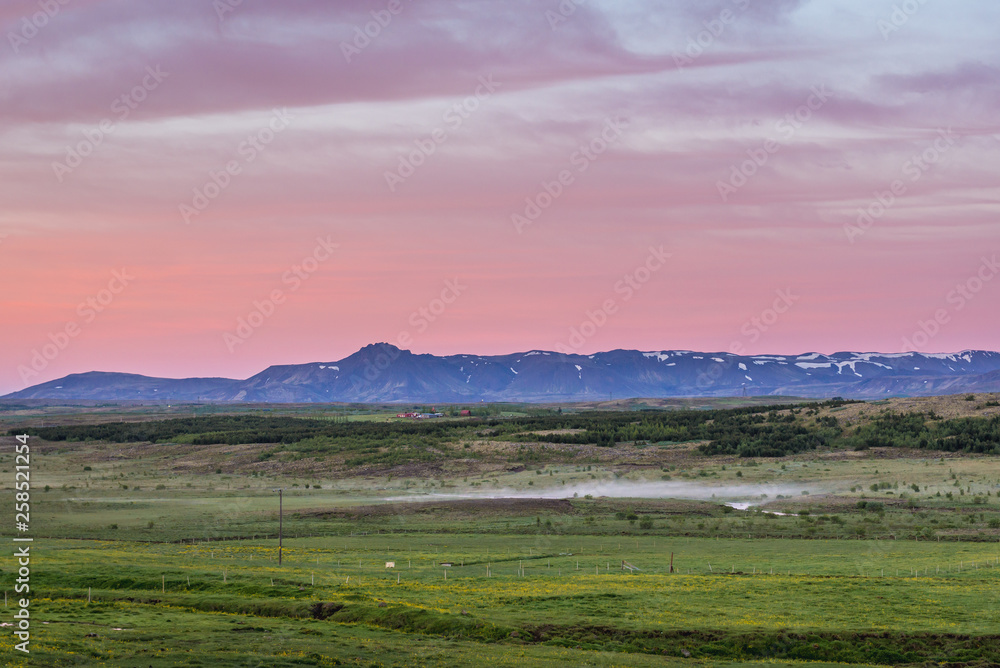 Evening sky over fields near Reykjavik in Iceland