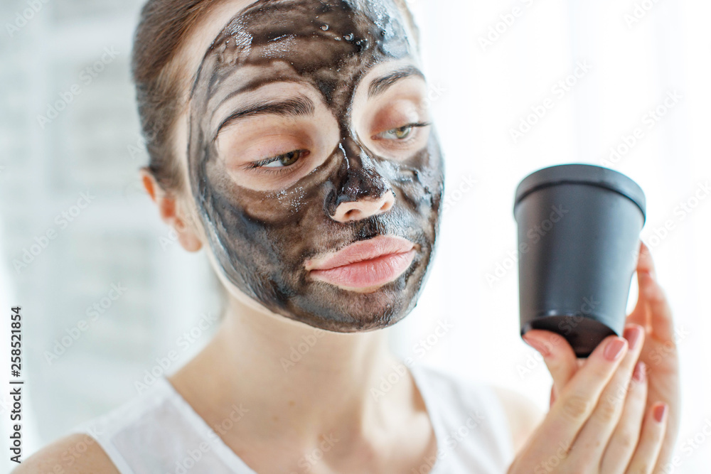 Woman with facial mask Woman with facial mask