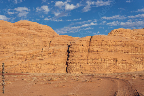 Rocky wall in Wadi Rum - valley of sand in Jordan