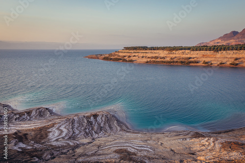 Dead Sea salt lake shore with so called rock salt in Jordan