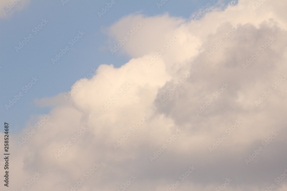 White clouds against the blue sky.