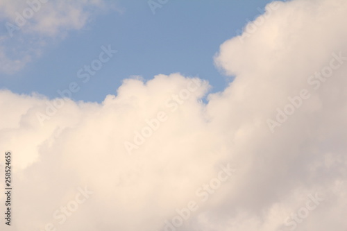 White clouds against the blue sky.