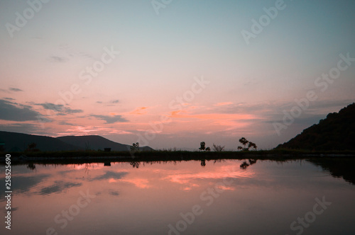 Beautiful clouds flying over the lake near mountains. Evening time shot over the clouds. Azerbaijan. Big Caucasus