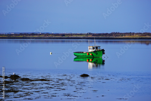 Small fishing boat in the bay