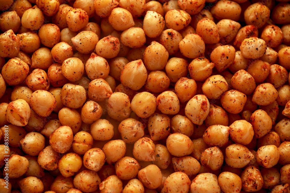 Roasted spicy chickpeas, background, texture. Healthy food. Roasted spicy chickpeas, background, texture. Healthy food.