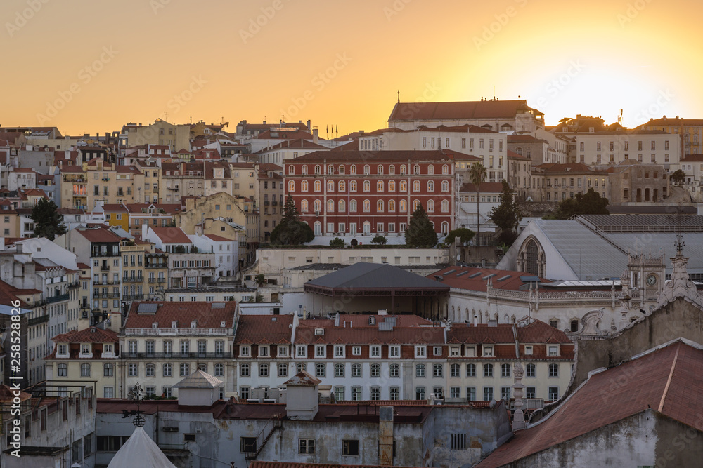 Sunset over buildings in Lisbon city in Portugal