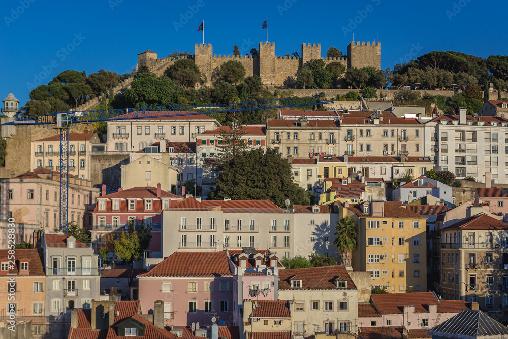 Cityscape of Lisbon city in Portugal with Saint George castle on a hill