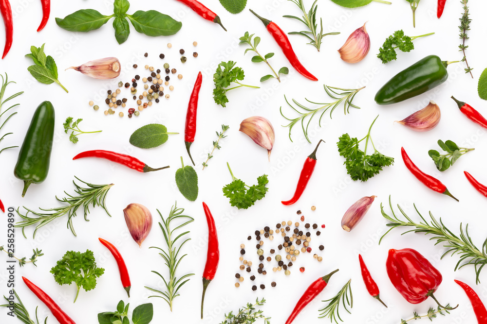 Spice herbal leaves and chili pepper on white background. Vegetables pattern. Floral and vegetables on white background. Top view, flat lay. Spice herbal leaves and chili pepper on white background. Vegetables pattern. Floral and vegetables on white background. Top view, flat lay.