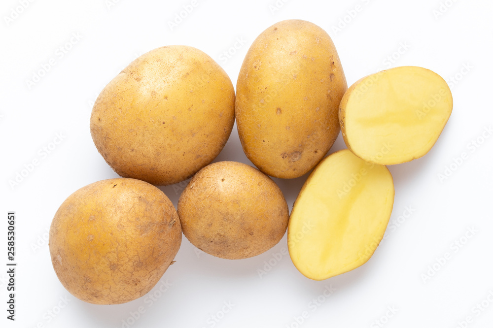 Potatoes isolated on white background. Flat lay. Top view. Potatoes isolated on white background. Flat lay. Top view.