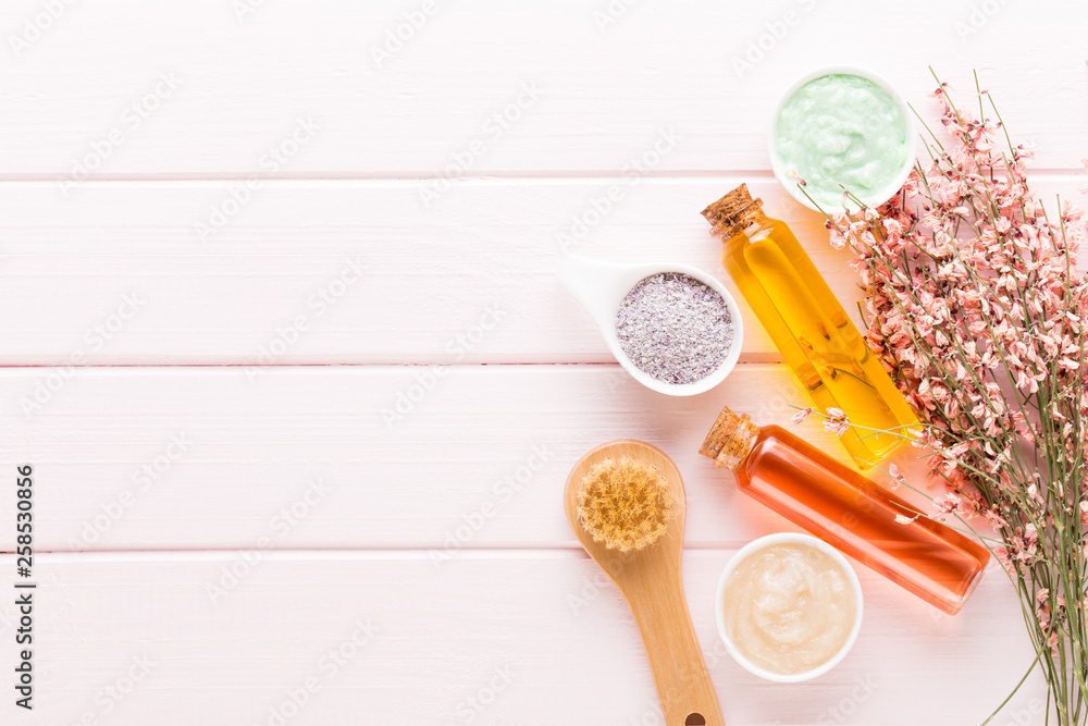 Beauty and fashion concept with spa set on pastel rustic wooden background. Beauty and fashion concept with spa set on pastel rustic wooden background.