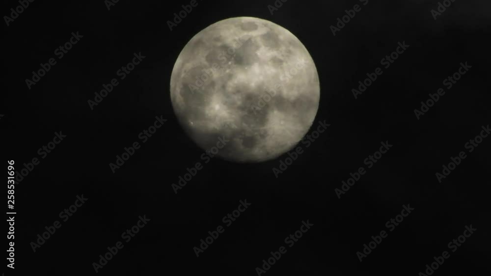 Moon with clouds passing by in the dark night sky, time lapse, cloudy, bright moon covered with clouds, highly detailed video Moon with clouds passing by in the dark night sky, time lapse, cloudy, bright moon covered with clouds, highly detailed video