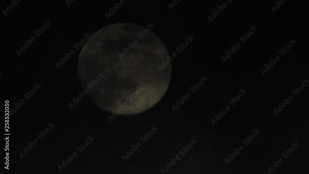 Moon with clouds passing by in the dark night sky, time lapse, cloudy, bright moon covered with clouds, highly detailed video Moon with clouds passing by in the dark night sky, time lapse, cloudy, bright moon covered with clouds, highly detailed video