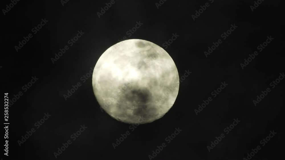 Moon with clouds passing by in the dark night sky, time lapse, cloudy, bright moon covered with clouds, highly detailed video Moon with clouds passing by in the dark night sky, time lapse, cloudy, bright moon covered with clouds, highly detailed video