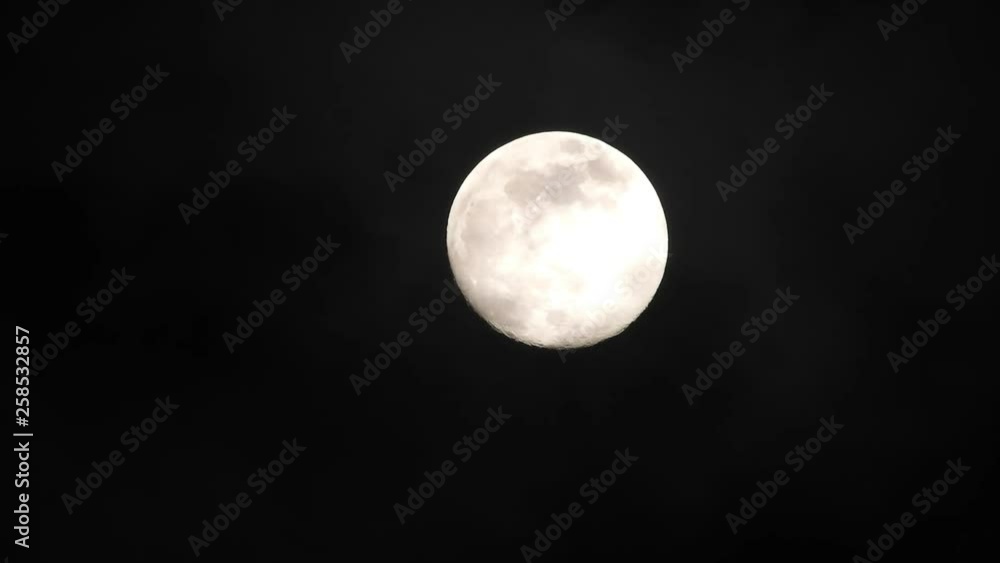Moon with clouds passing by in the dark night sky, time lapse, cloudy, bright moon covered with clouds, highly detailed video Moon with clouds passing by in the dark night sky, time lapse, cloudy, bright moon covered with clouds, highly detailed video