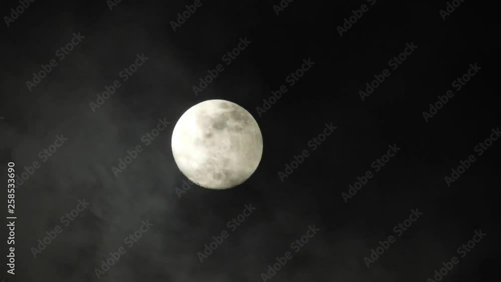 Moon with clouds passing by in the dark night sky, time lapse, cloudy, bright moon covered with clouds, highly detailed video Moon with clouds passing by in the dark night sky, time lapse, cloudy, bright moon covered with clouds, highly detailed video