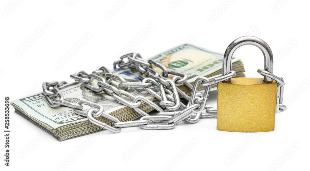 Stack of money wrapped by metal chain with padlock on white background.