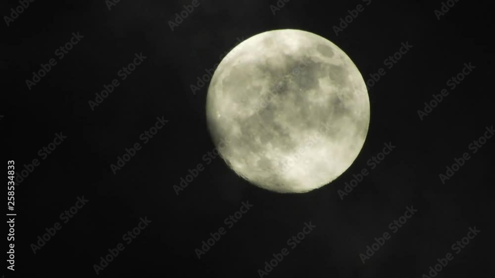Moon with clouds passing by in the dark night sky, time lapse, cloudy, bright moon covered with clouds, highly detailed video Moon with clouds passing by in the dark night sky, time lapse, cloudy, bright moon covered with clouds, highly detailed video