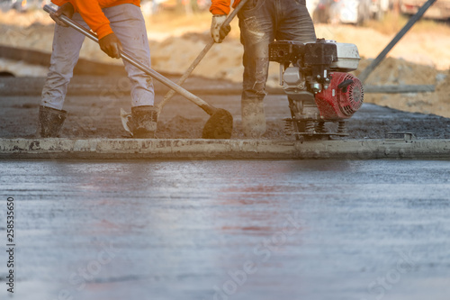 Concrete road construction workers, Construction worker team