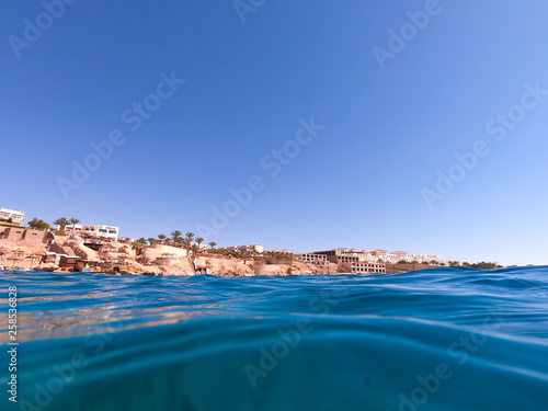SHARM EL SHEIKH, EGYPT, Hotel Concorde El Salam - March 18, 2019: Red Sea, view of the beach from the water.