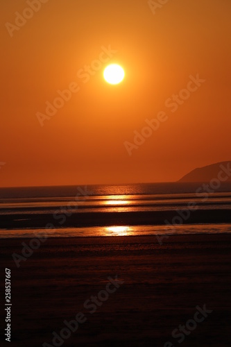 Sunset beach image over the Somerset coastline of western super mare England © Wendy