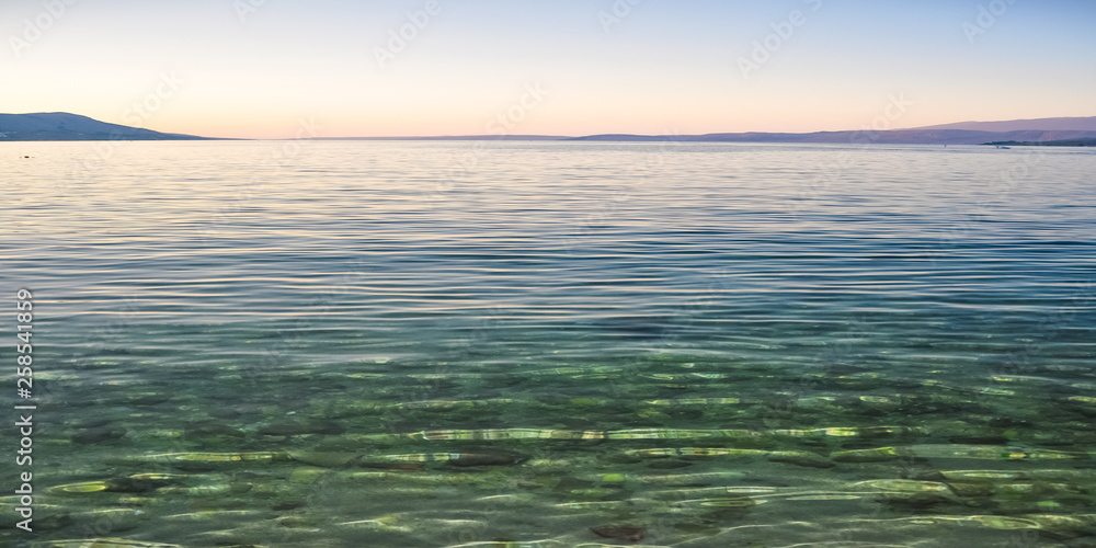 Obraz premium Beach in the coast of Adriatic Sea island Pag, Croatia after sunset