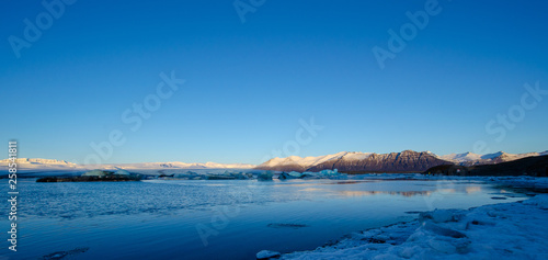 Calm winter day in Iceland with view of snowy landscape