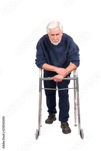 Weak and Discouraged Old Man With Walker Isolated On White