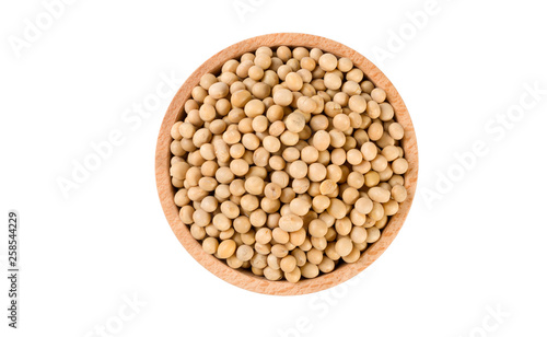 soy bean in wooden bowl isolated on white background. nutrition. food ingredient.