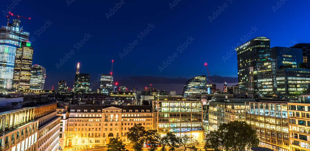 Aerial view of skyscrapers of the world famous bank district of central London at sunset