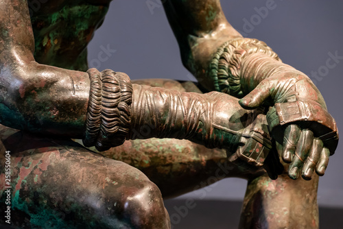 Detail of the arms of an ancient roman bronze statue