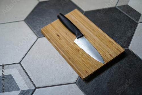 Fototapeta Naklejka Na Ścianę i Meble -  Wooden cutting board and knife