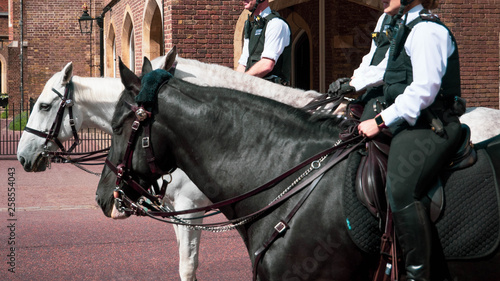 Two british police officers riding horses in London