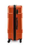Side view photo of orange plastic travel suitcase with wheels