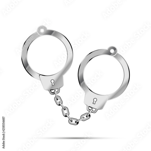 Realistic metal police handcuffs with shadow isolated on white
