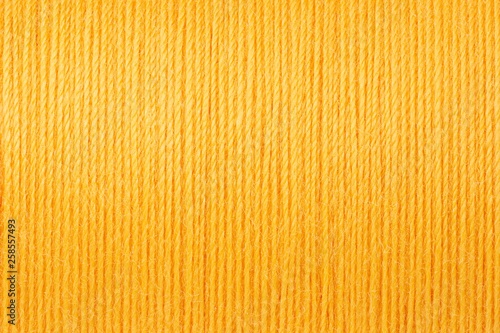 Macro picture of yellow thread texture background