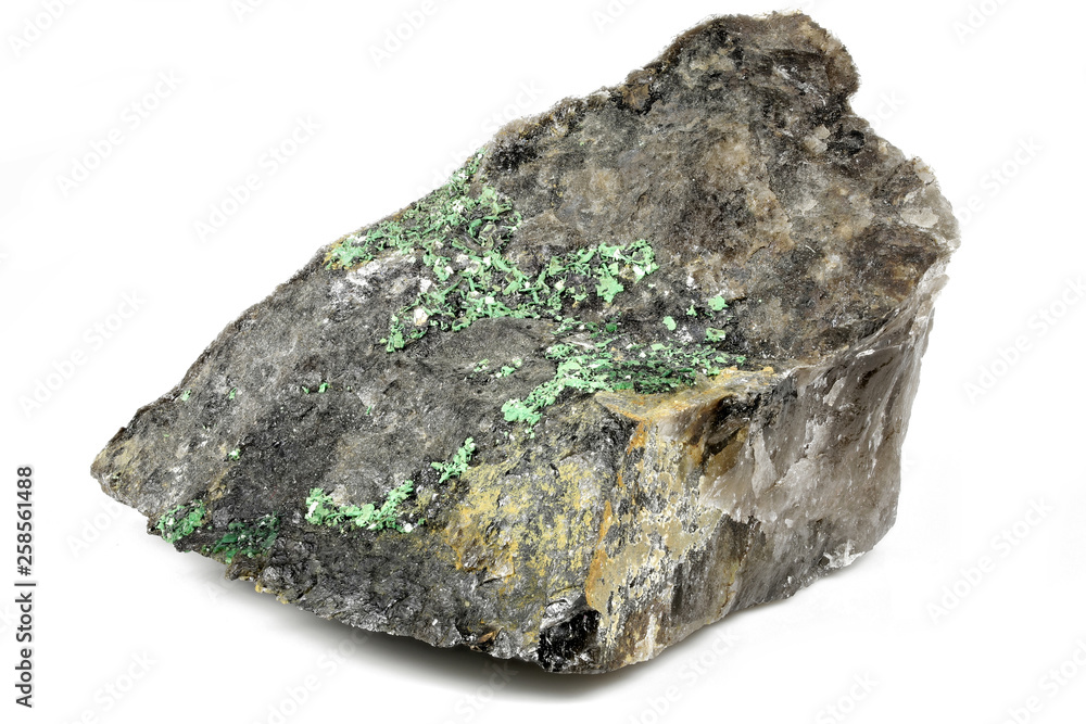 torbernite (uranium ore) from Portugal isolated on white background torbernite (uranium ore) from Portugal isolated on white background