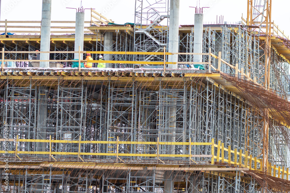 Construction formwork for casting of monolithic concrete structures and scaffolding